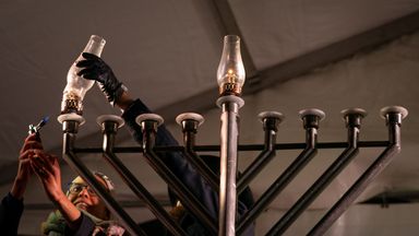 light the first candle of the Menorah